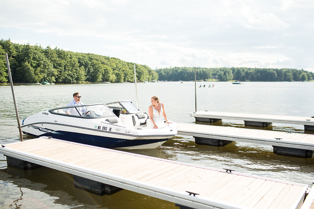 bride and groom on boat at deep creek lake